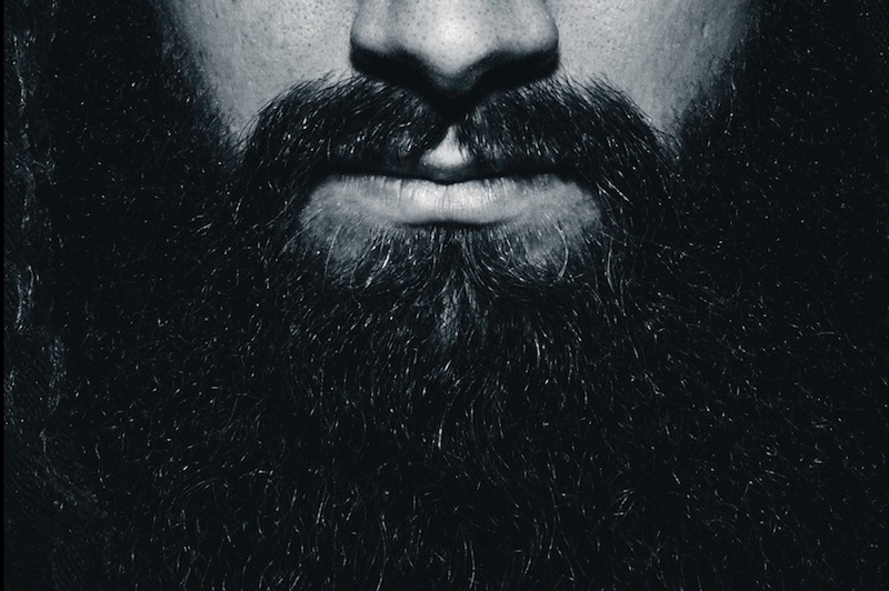 Up close image of a man with a beard