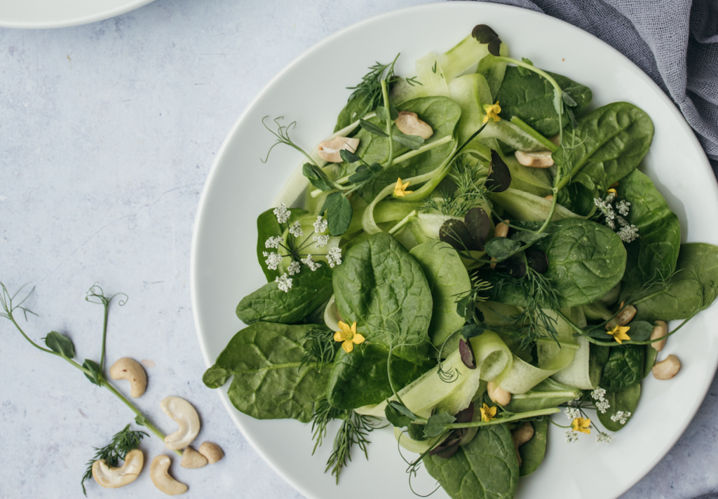 Plate of spinach leaves and greens