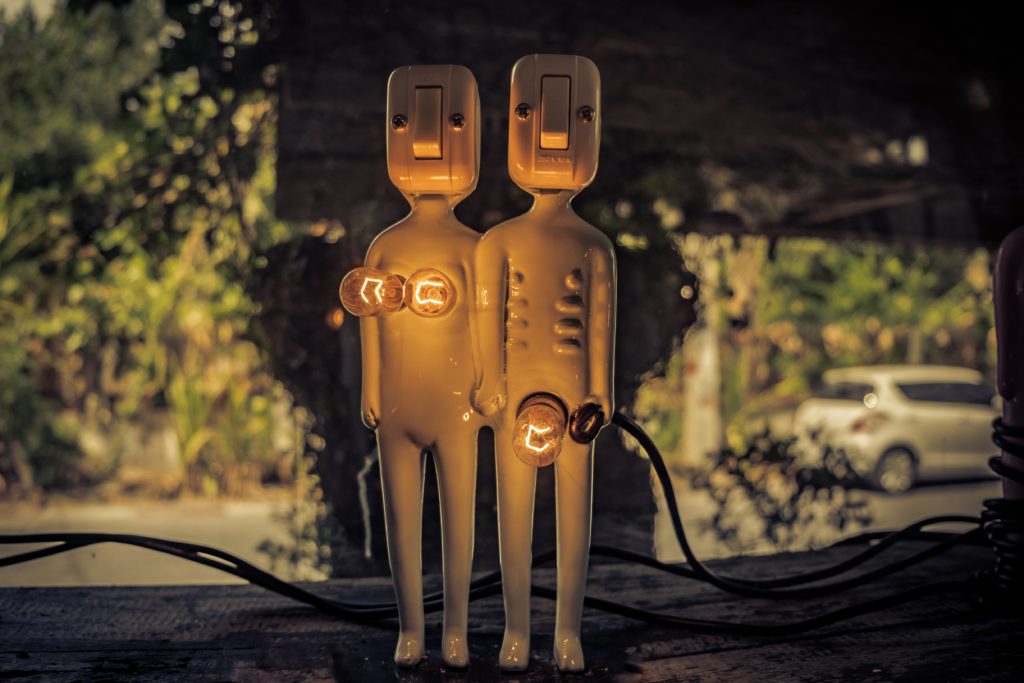 male and female statues with lightbulb genitals. Awkward.