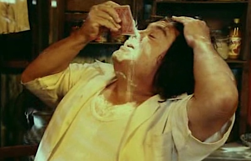Frank Reynolds pouring cocaine into his nose.