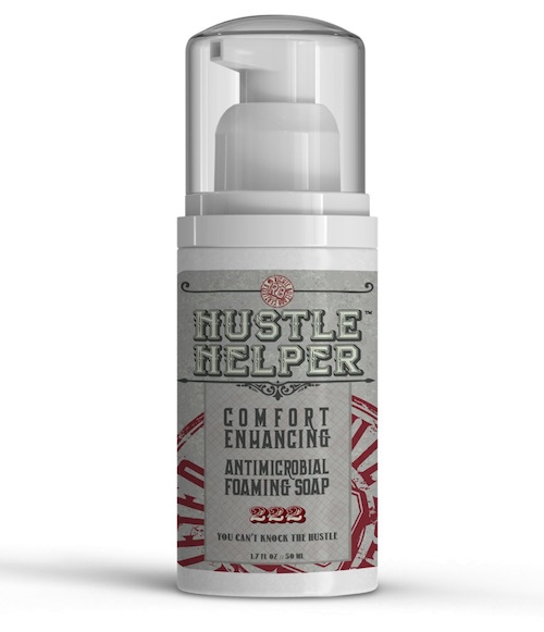 A bottle of Hustle Helper Antibacterial Foaming Soap
