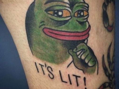 Picture of a meme tattoo saying "it's lit!"