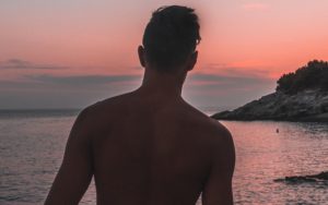 Man standing near the sea