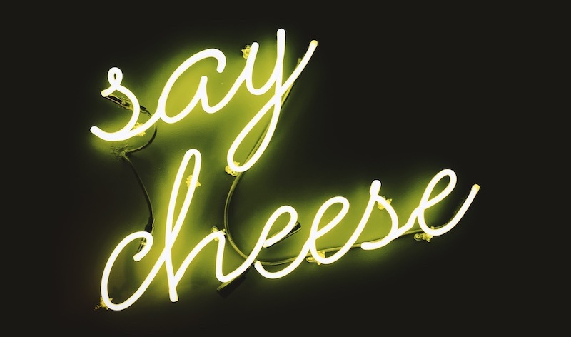 Neon sign that says "Say Cheese"