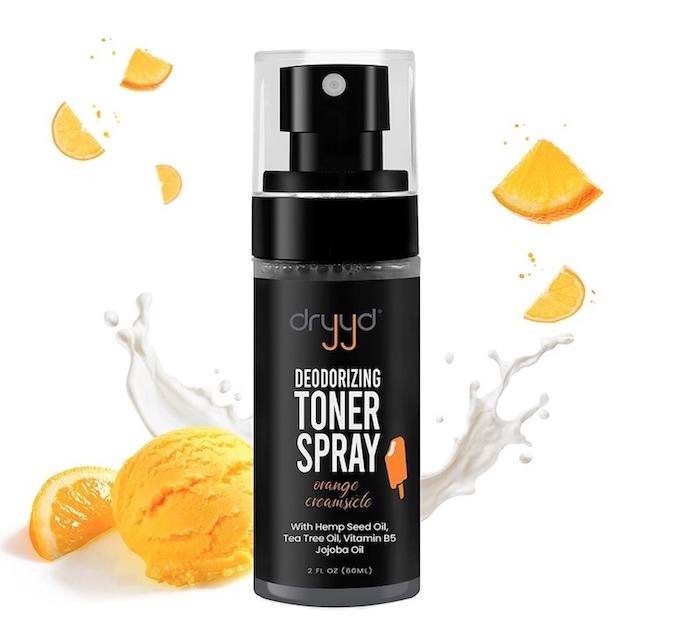 A bottle of Dryyd Deodorizing Toner Spray for balls